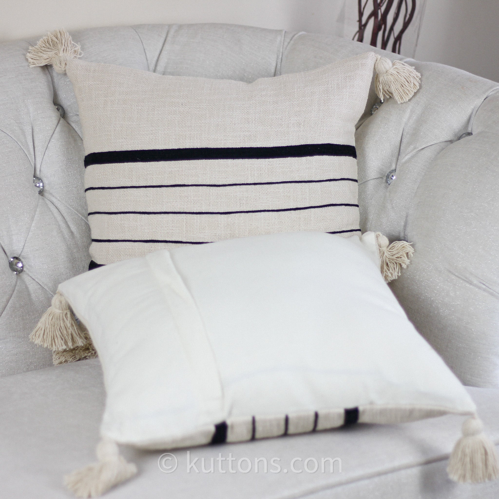 https://www.kuttons.com/cdn/shop/products/HandmadeTexturedCottonStripedPillowCover-LargeCornerTassels-4_2400x.jpg?v=1668736219