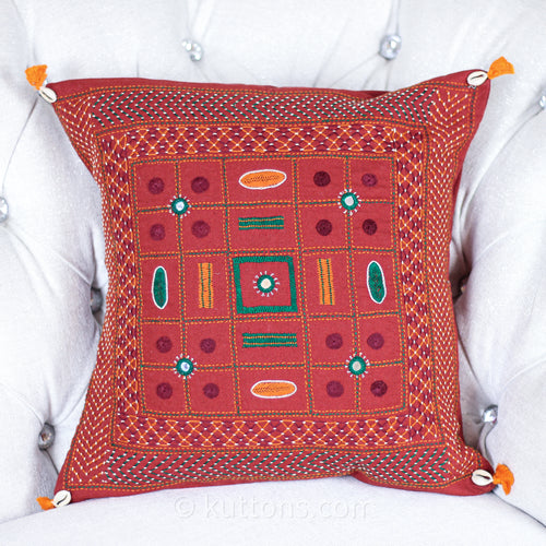 https://www.kuttons.com/cdn/shop/products/TribalLambaniHandEmbroideredCushionCover-WithKodiSeaShellTassels-2_500x.jpg?v=1667096930